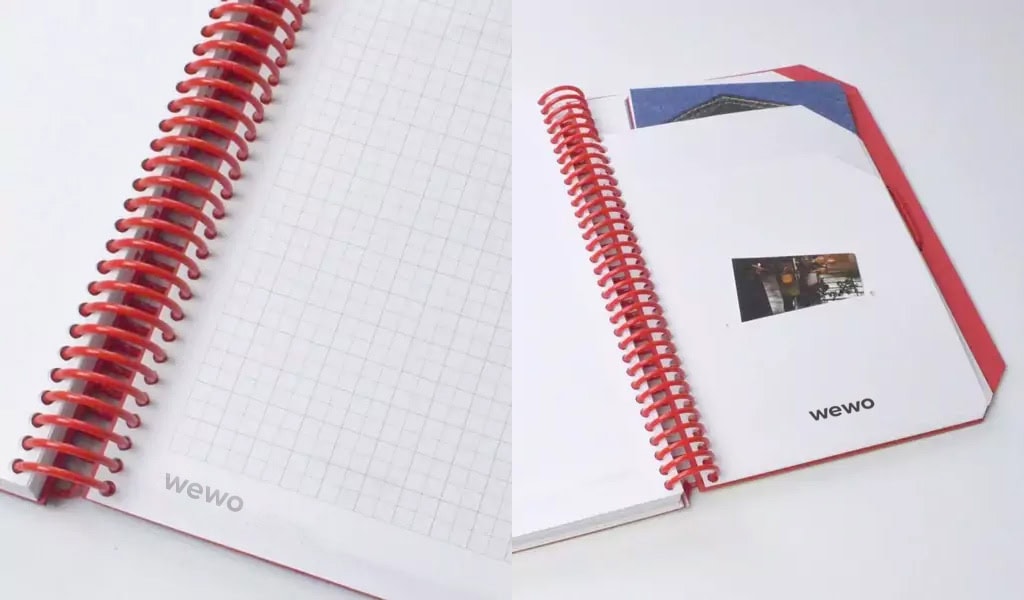 Cahiers personnalisés avec couverture colorée et spirale rouge, idéal pour la papeterie d'entreprise.